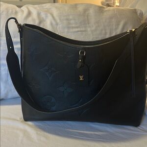 Authentic Louis Vuitton Empreinte CarryAll MM.